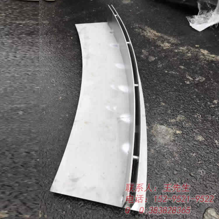 Curved stainless steel slotted linear drain plate